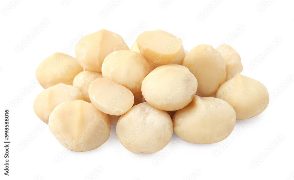 Pile of peeled macadamia nuts isolated on white Pile of peeled macadamia nuts isolated on white
