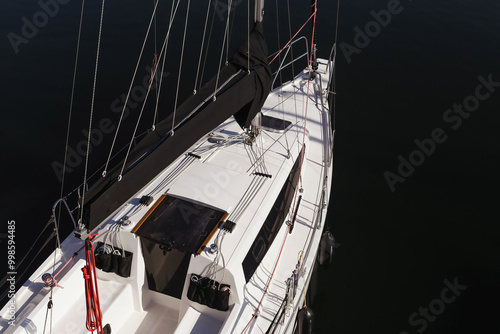 Foto Yacht moored at marina pier