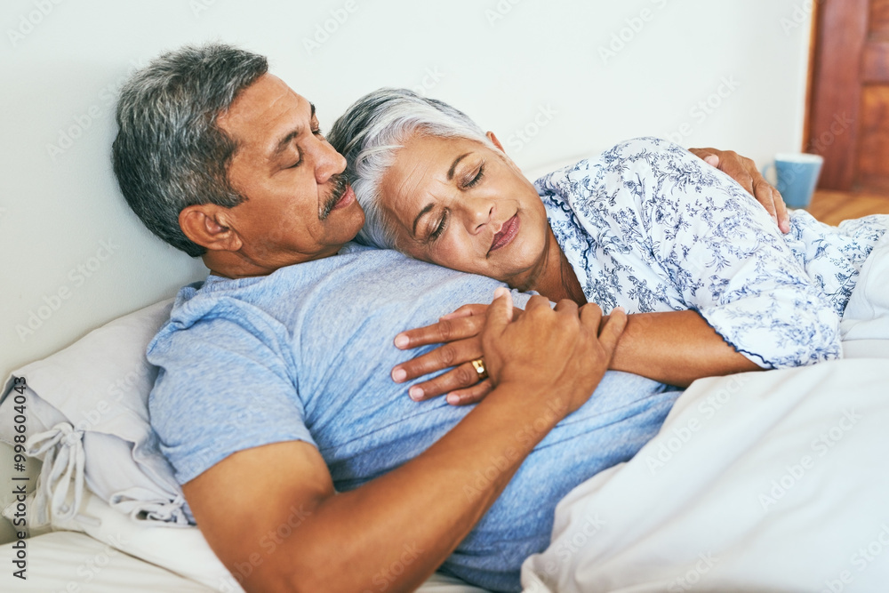 Cuddle, sleeping and senior couple in bed with rest for love, support and nap in afternoon together. Tired, people and relax with blanket at home for retirement, connection and comfort on weekend Cuddle, sleeping and senior couple in bed with rest for love, support and nap in afternoon together. Tired, people and relax with blanket at home for retirement, connection and comfort on weekend