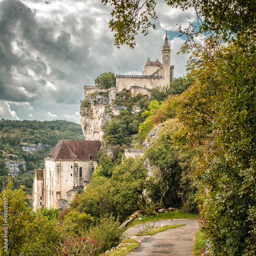 The Sanctuaire and Chateau standing on the cliffs above the sacred village of Rocamadour in the Lot region of France photo