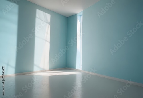 An empty room with light blue walls and a white floor, featuring a window on the right wall that allows sunlight to stream in, creating a bright and airy atmosphere