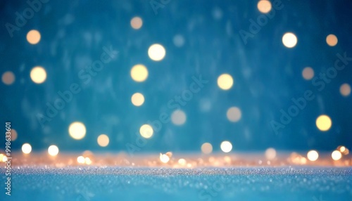 a blurred blue background with scattered white and yellow lights, creating a bokeh effect photo