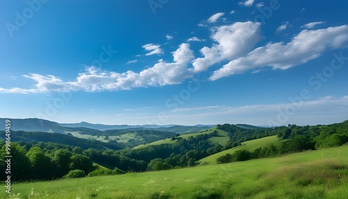 Idyllic rolling hills and lush trees beneath a vibrant blue sky, capturing the essence of nature and travel photography