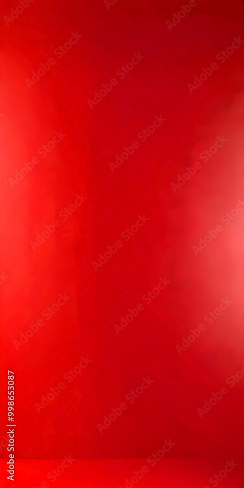 a red wall with a gradient effect, transitioning from a darker shade at the top to a lighter one at the bottom a red wall with a gradient effect, transitioning from a darker shade at the top to a lighter one at the bottom