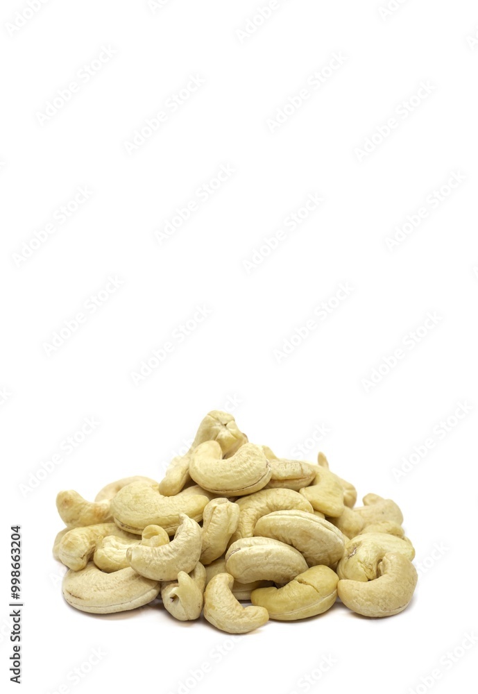 Closeup of Cashew Nut Heap Isolated on White Background with Copy Space, Healthy Eating Dry Fruit Closeup of Cashew Nut Heap Isolated on White Background with Copy Space, Healthy Eating Dry Fruit