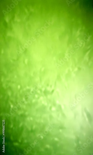 a blurred, greenish-blue gradient background with a textured, abstract appearance photo