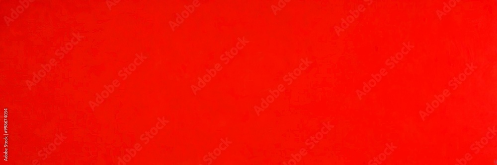 Fototapeta premium a close-up view red fabric surface, with a slight texture visible
