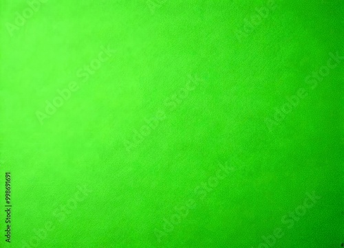 a solid, vibrant green color, which appears to be a sheet of paper or a similar material