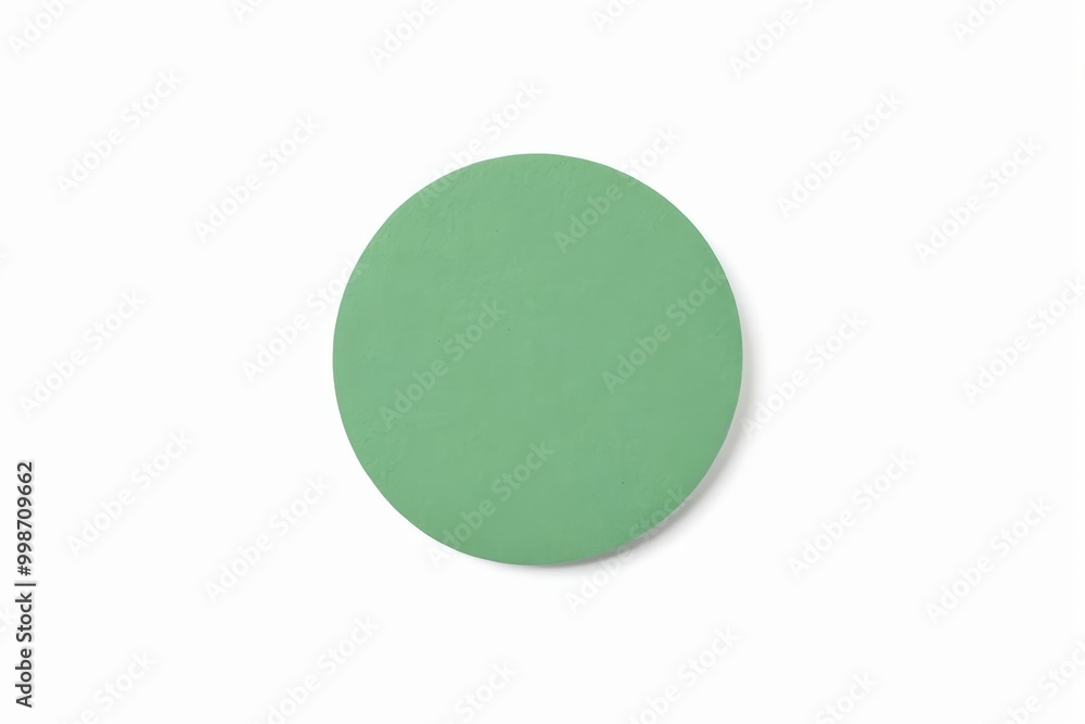 there is a green circle on a white surface with a white background there is a green circle on a white surface with a white background