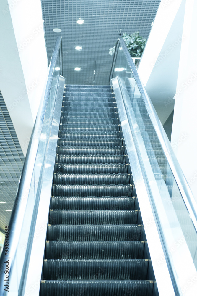 Empty escalator steps on staircase in airport Empty escalator steps on staircase in airport