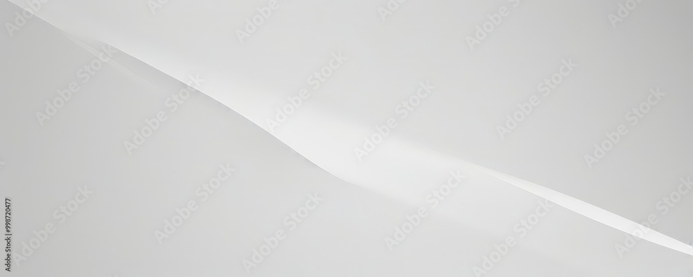 a white, abstract background with a diagonal line running across it, creating a sense of movement and direction
