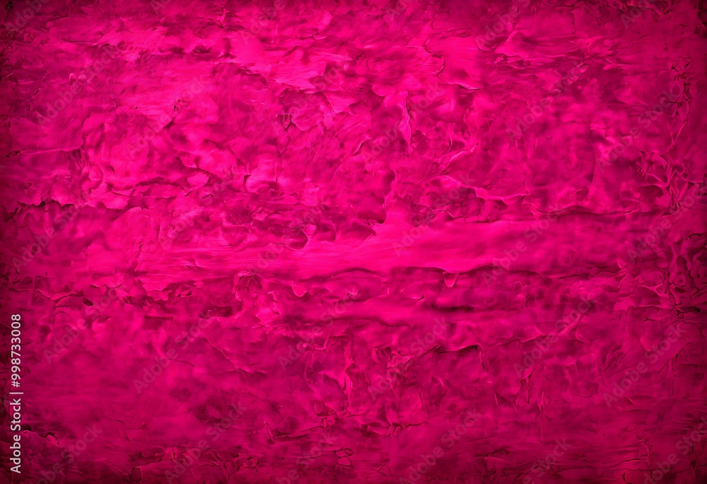 Fototapeta premium a close-up view textured surface with a vibrant pink hue The surface appears to be a mix of various materials, including fabric and paper, creating a visually