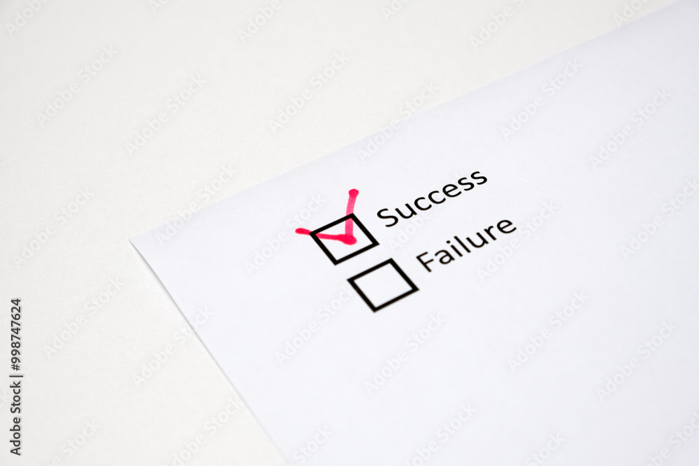 Success check box red on white sheet paper Success check box red on white sheet paper