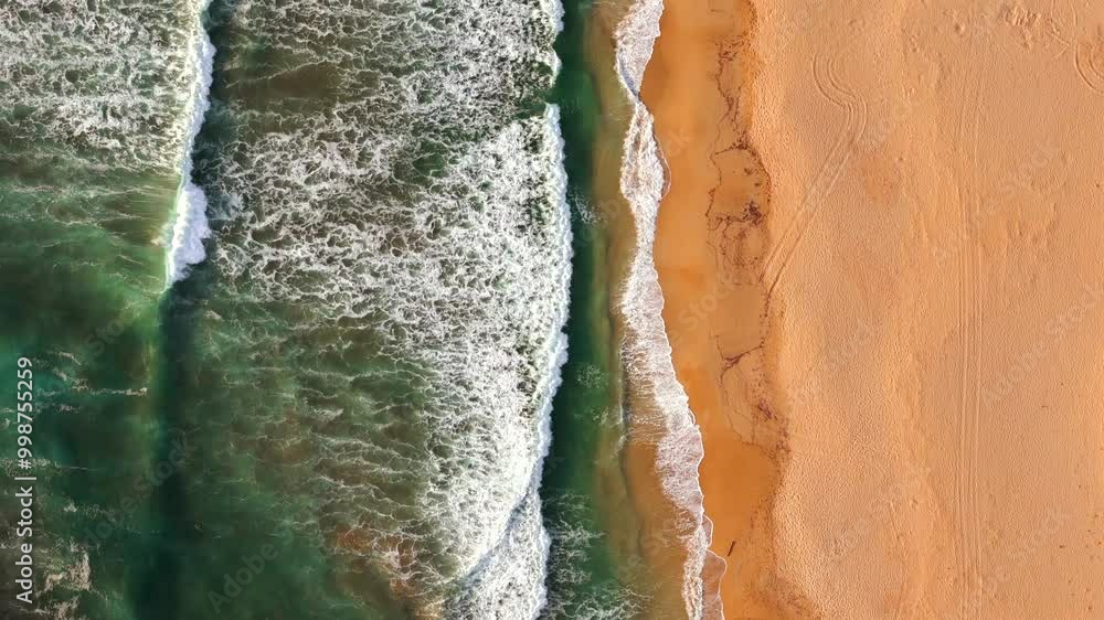 The beach displays a serene landscape with golden sands, calming waves. Italy The beach displays a serene landscape with golden sands, calming waves. Italy