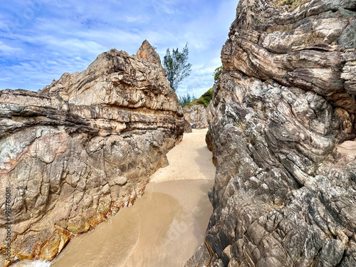 Large rocks with beautiful natural shapes at Da Nhay beach, Quang Binh, Vietnam photo