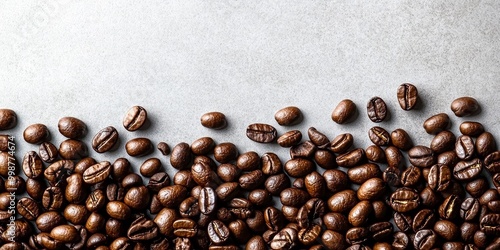 Scattering a few coffee beans around a copy space image