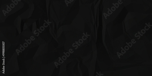 Black crumpled paper texture background. Crumpled paper ball isolated on black with clipping path. panorama grunge wrinkly paper texture background, crumpled pattern texture. paper crumpled texture.