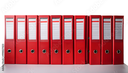 A row of red binders with white labels