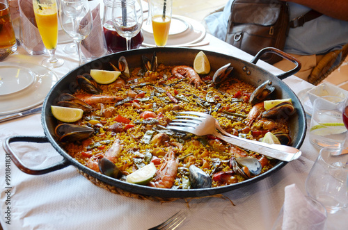 Paella with seafood and rabbit- traditional Spanish cuisine.