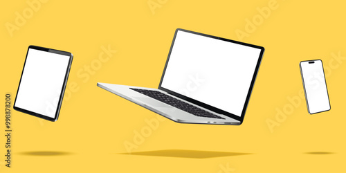 Laptop computer, smartphone and tablet while levitating in the air on a yellow background