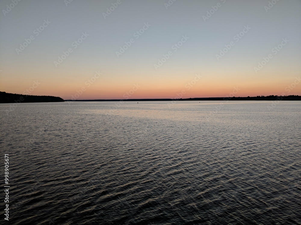 Obraz premium sunset over the river