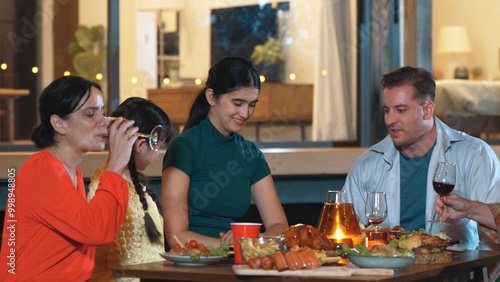 Family gather celebrate holiday. Parents, grandparents and girl together to talk and have dinner party food. Outdoor activity for spending time with multigeneration cross generation gap. Divergence. photo