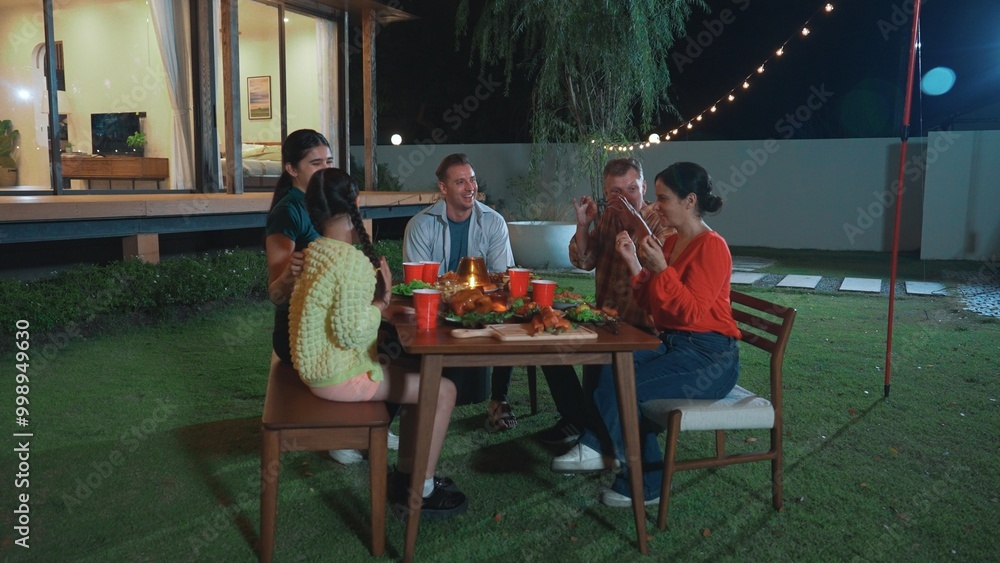 Family gather celebrate holiday. Parents, grandparents and girl together to talk and have dinner party food. Outdoor activity for spending time with multigeneration cross generation gap. Divergence. Family gather celebrate holiday. Parents, grandparents and girl together to talk and have dinner party food. Outdoor activity for spending time with multigeneration cross generation gap. Divergence.