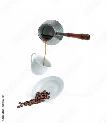Cup of Turkish coffee and Turk. Levitation. Light background.