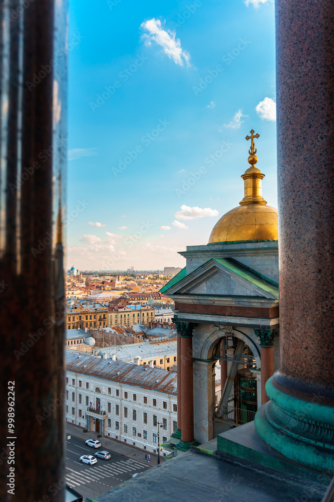 Panoramic view of the city and the beautiful roofs of the city on a sunny day from The colonnade of St. Isaac's Cathedral.. Saint Petersburg, Russia - 26 June 2024 Panoramic view of the city and the beautiful roofs of the city on a sunny day from The colonnade of St. Isaac's Cathedral.. Saint Petersburg, Russia - 26 June 2024
