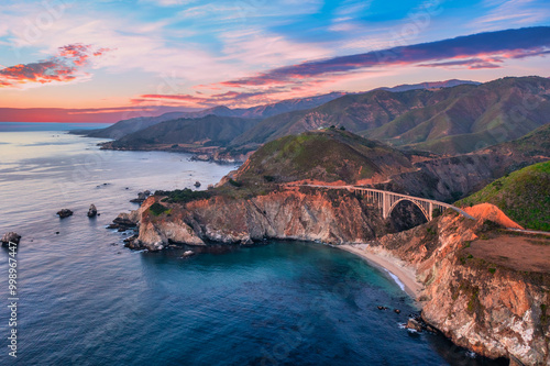 Bixby Bridge on Highway 1 and Big Sur along Pacific Ocean coast, beautiful landscape and aerial view, sunset, sunrise, fog. Concept, travel, vacation, weekend