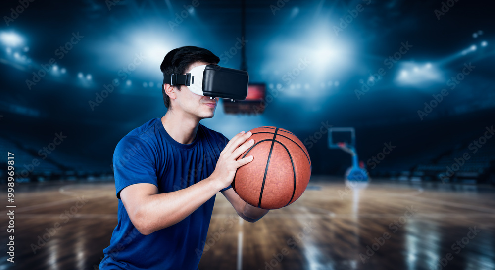 Basketball player holding basketball hologram at futuristic sport arena. Energetic athlete or sport person practicing basketball skill by using augmented reality technology. Innovation. Ingenuity. Basketball player holding basketball hologram at futuristic sport arena. Energetic athlete or sport person practicing basketball skill by using augmented reality technology. Innovation. Ingenuity.