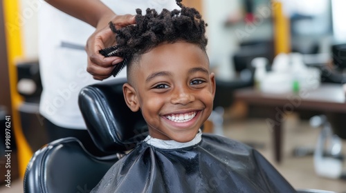 Joyful child with a big smile sitting in a barber chair during a haircut in a friendly barbershop environment. The scene exudes happiness and youthful energy. photo