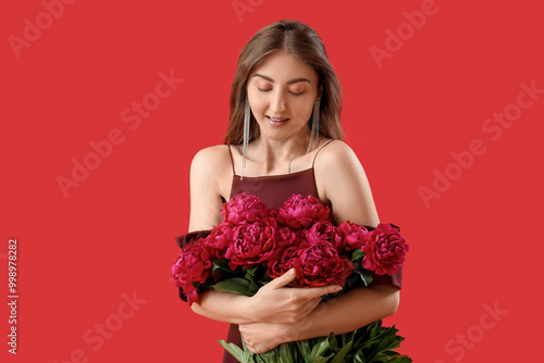 Beautiful young woman with ...