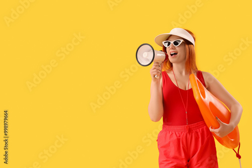 Female lifeguard with rescu...
