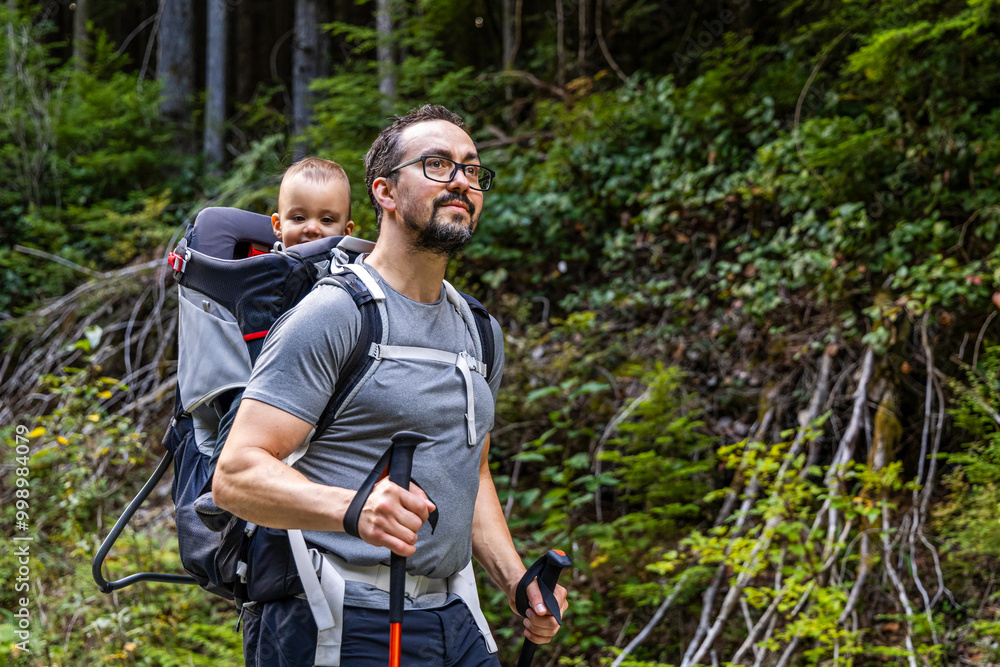 Father and Baby Hiking in Forested Trail at Mission, BC, Canada, Embracing Outdoor Adventure and Nature Father and Baby Hiking in Forested Trail at Mission, BC, Canada, Embracing Outdoor Adventure and Nature