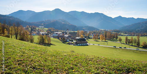 rural village Fischbachau, autumnal landscape and mountain view upper bavaria. photo