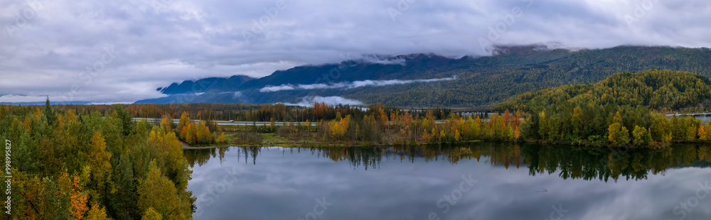 Scenic panoramic view of Reflection lake in Alaska during autumn time. Scenic panoramic view of Reflection lake in Alaska during autumn time.