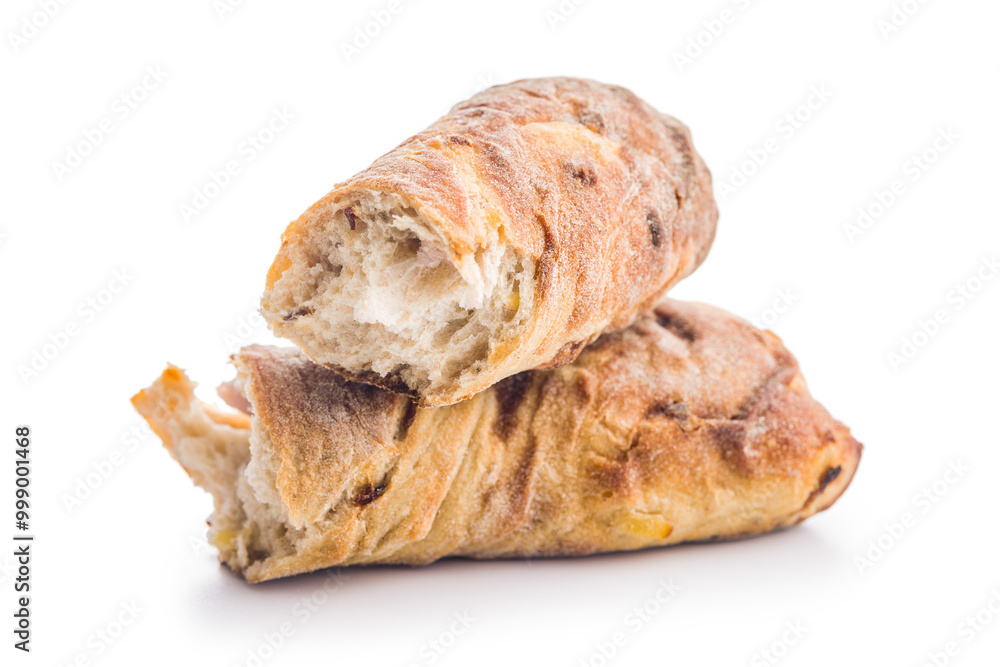 Crusty rustic baguette isolated on white table. Crusty rustic baguette isolated on white table.