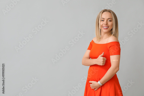 Young pregnant woman after ...