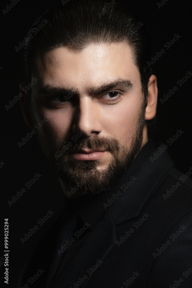 Strict male portrait. The guy in the classic black suit. Strict male portrait. The guy in the classic black suit.