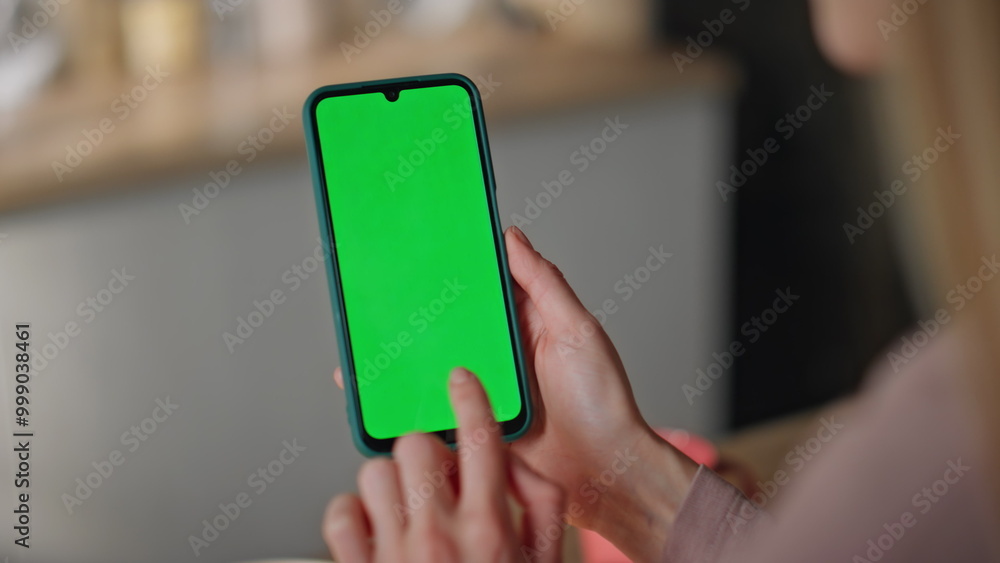 Girl browsing app chroma key smartphone making online order at home close up. Girl browsing app chroma key smartphone making online order at home close up.