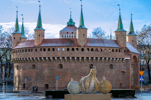 Barbican is defense gateway from 1490s in Krakow, Poland photo