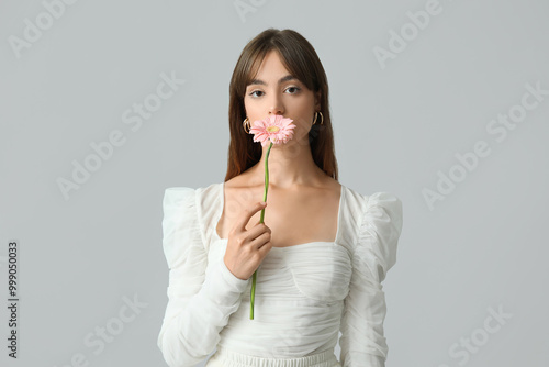 Beautiful young woman with ...