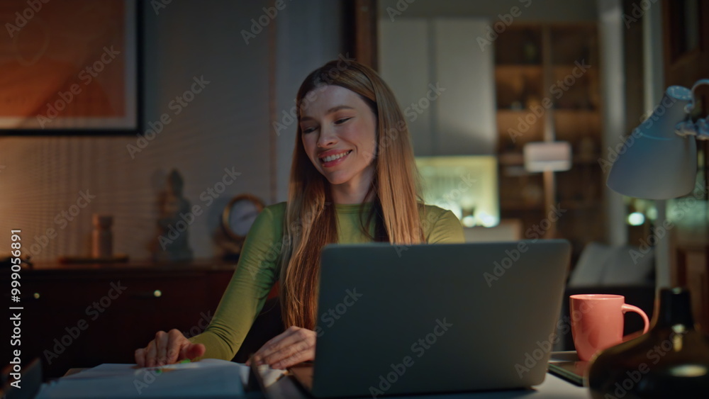 Satisfied startuper working late creating project on laptop closeup. Girl typing Satisfied startuper working late creating project on laptop closeup. Girl typing