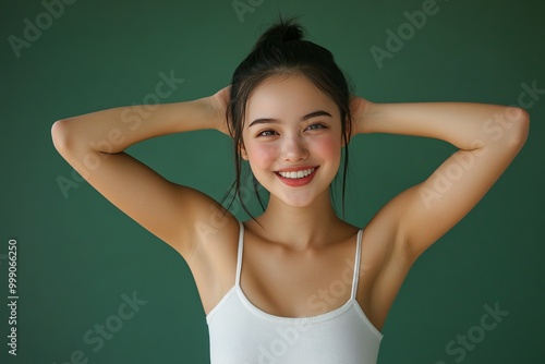 Photo of smiling young woman wear white top plump lips showing arms scales empty space isolated green color background, 