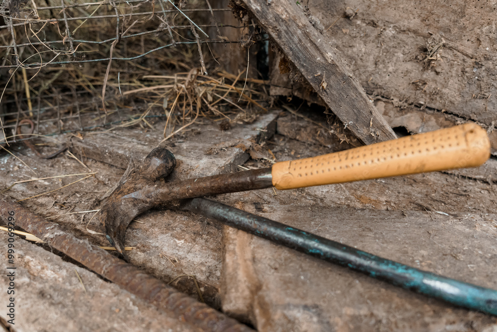 Fototapeta premium Rustic Tool Arrangement in a Weathered Barn Setting