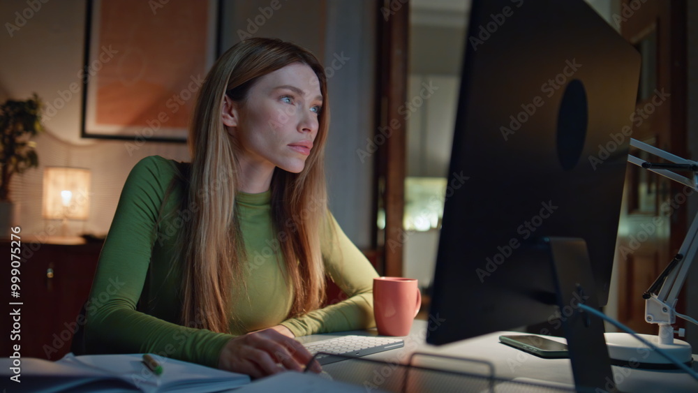 Woman busy overtime work at dark remote workplace closeup. Businesswoman looking Woman busy overtime work at dark remote workplace closeup. Businesswoman looking
