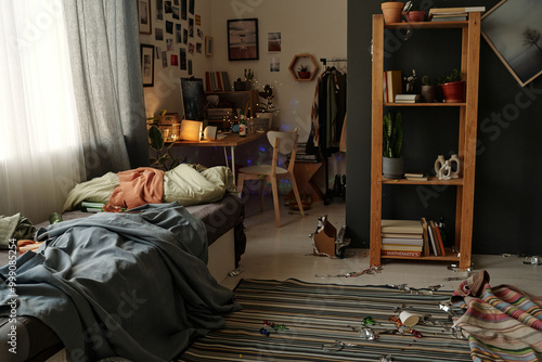 Εκτύπωση καμβά Spacious messy bedroom with striped rug on the floor, bed with creased sheets an