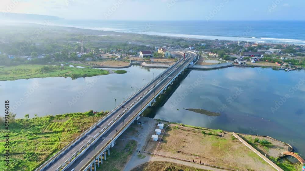 Modern highway bridge near ocean in Indonesia, aerial view Modern highway bridge near ocean in Indonesia, aerial view