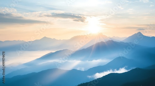 Scenic mountain landscape at sunrise with light filtering through the clouds, setting a serene mood for an inspirational quote.